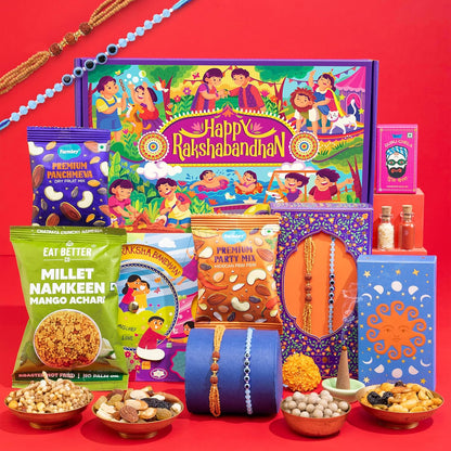 9-in-1 Rakhi Gift Box for Brother & Bhabhi | Combo of 2 Rakhis (Rudraksha & Ocean Gaze) | Farmley Dry Fruit Mix, Party Mix | Eat Better Millet Namkeen | Guru Chela Mouth Freshener | Greeting Card